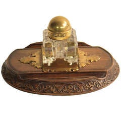 A Victorian oak and glass inkstand.