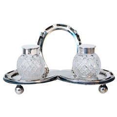 A Victorian silver plate horseshoe motif inkstand .