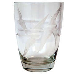 An Orrefors glass vase .