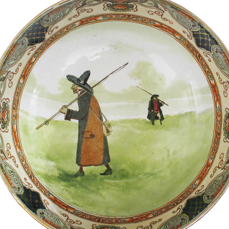 Antique Fishing Bowl by Isaac Walton for Royal Doulton. A rare Royal Doulton, Isaac Walton designed fruit bowl with traditional fishing scene of two anglers painted inside the bowl. The boarder with typical decorative Jedo rim pattern in cobalt