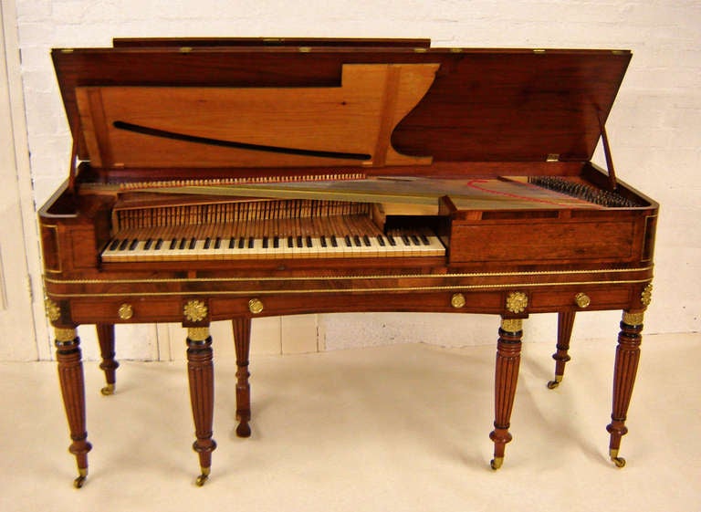 James Nutting, 92 Dean Street, London. 
Square piano made c1817 number 2220 with six turned and fluted legs with a single pedal. Name engraved on brass name-boards plate. Overall dimensions – height 34”, width 25.5” Length 68 “. Keyboard five and