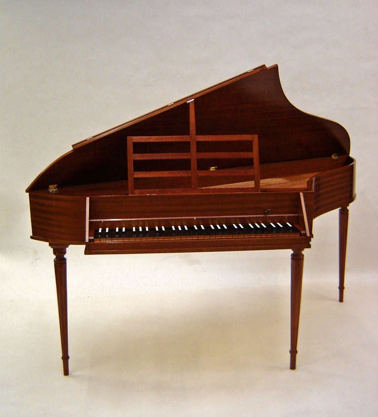 John Morley 5 octave spinet in mahogany finish on turned and fluted legs with nylon jacks and delrin plectra with buff made in c1969 

No.1789 c1969 
Compass : 5 octave G-G 

Made in London, England 

The English bentside spinet or wing