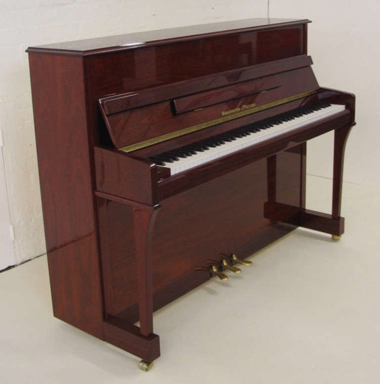Monington and Weston 110cm traditional upright piano new.
Available in black polished, dark mahogany polished and medium mahogany polished.finish subject to availability

Full compass - 7¼ octaves – 88 notes.
Three pedals.