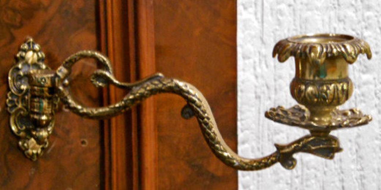 Snake sconces in brass (candle stock holders) for upright piano or could be used as wall sconces in brass, circa 1910 second hand, articulated circa 1880 second hand.