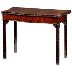 Used George III mahogany serpentine concertina action card table in the manner of Wright & Elwick