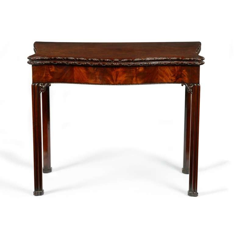 George III mahogany serpentine concertina action card table