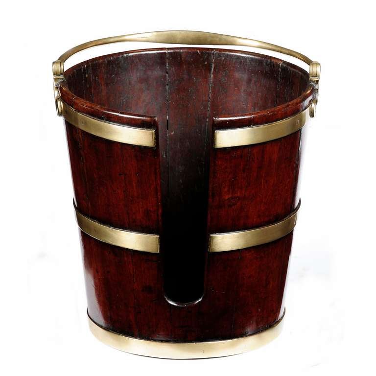 A pair of Irish III mahogany brass bound plate buckets at 1stdibs