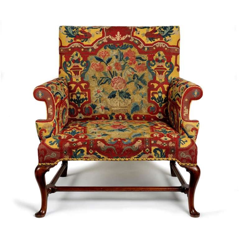 A fine rare Queen Anne walnut and needlework upholstered 