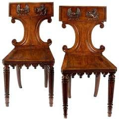 Antique A pair of Regency brown oak hall chairs attributed to George Bullock