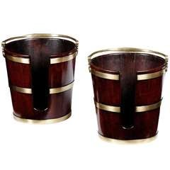 A pair of Irish George III mahogany brass bound plate buckets