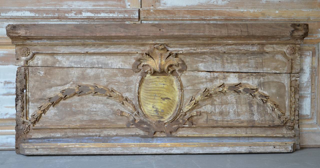 18th century boiserie panel fragment with ornate and inticately carved with original patina and gilt.
