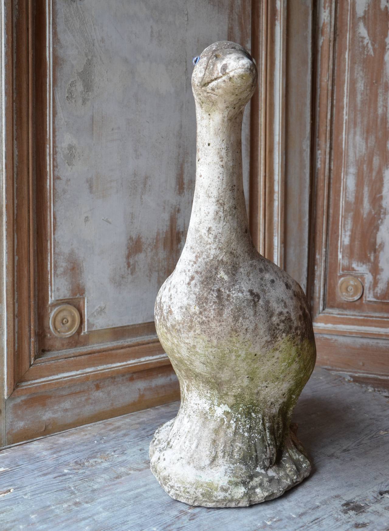 Charming 19th century stone goose for your garden with traces of the original painted finish.
France, late 19th century.