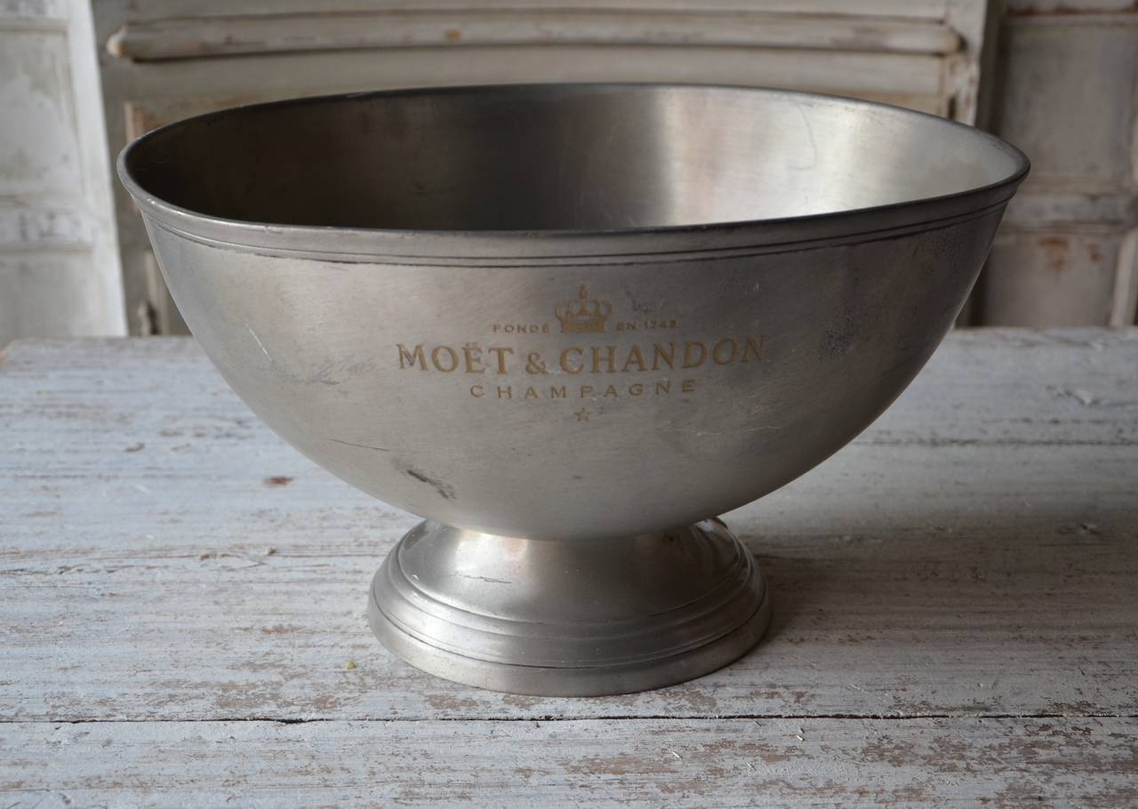 Vintage French Champagne Coolers from 1940-1950 in worn pewter and feature the inscriptions along the sides 