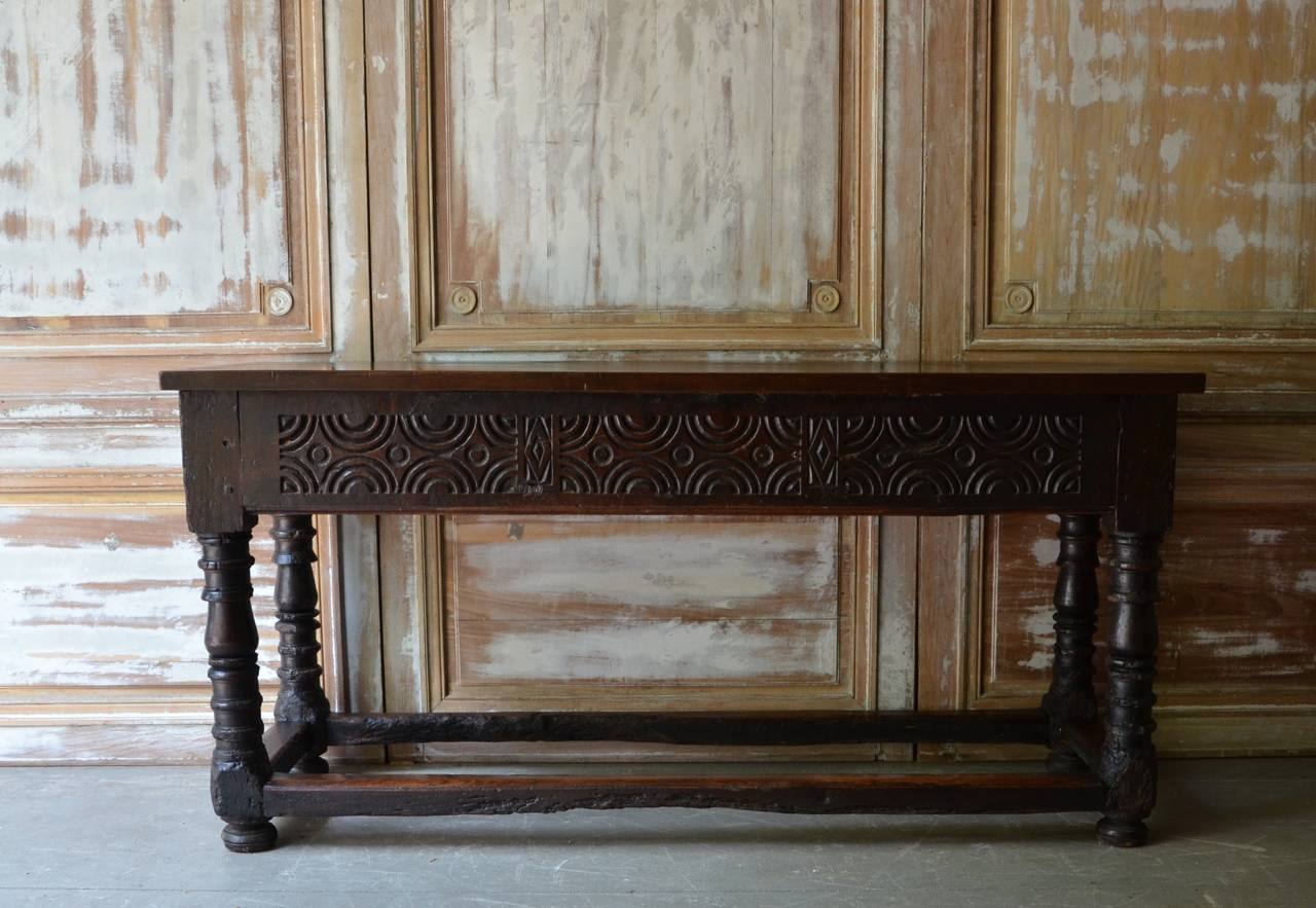 17th century Spanish library or console table with three-drawer and carved apron in patinated “Silvae Castanae” (chestnut woods), circa 1650 Rioja, Spain
Sturdy, antique condition.