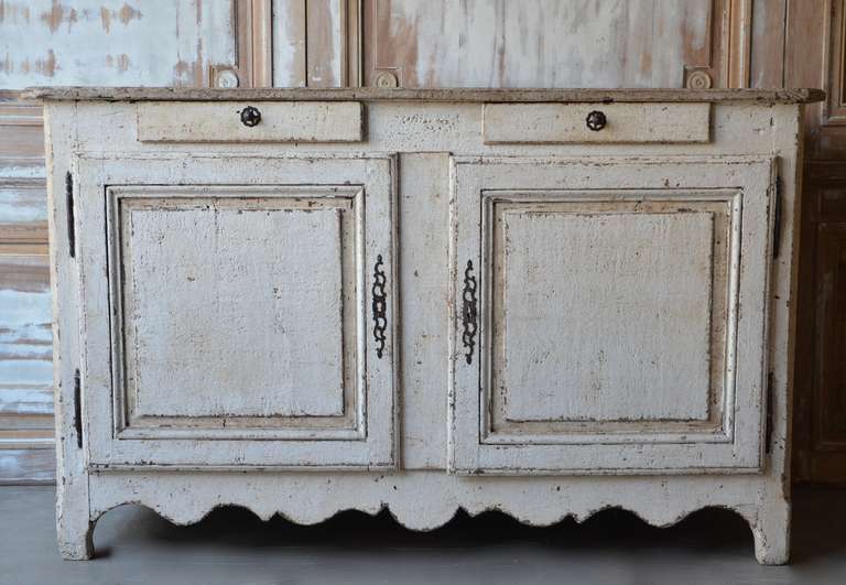 Large, handsome 19th century pained Buffet with raised panel doors, two drawers and lovely shaped apron. France ca. 1880