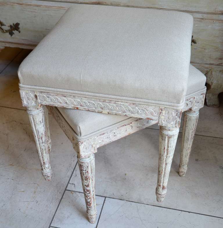 A pair of Gustavian stools scraped to original color with new linen upholstery.
Sweden circa 1800