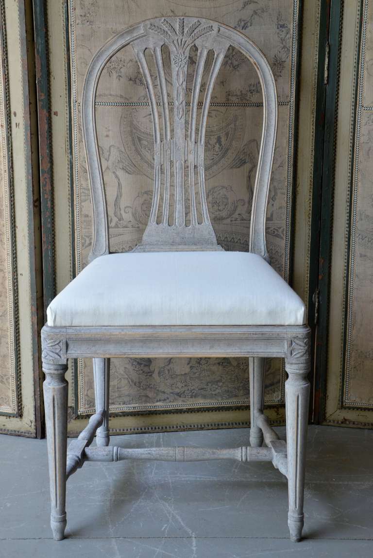 A Set of eight Swedish Painted Wheatsheaf Dining Chairs circa 1900