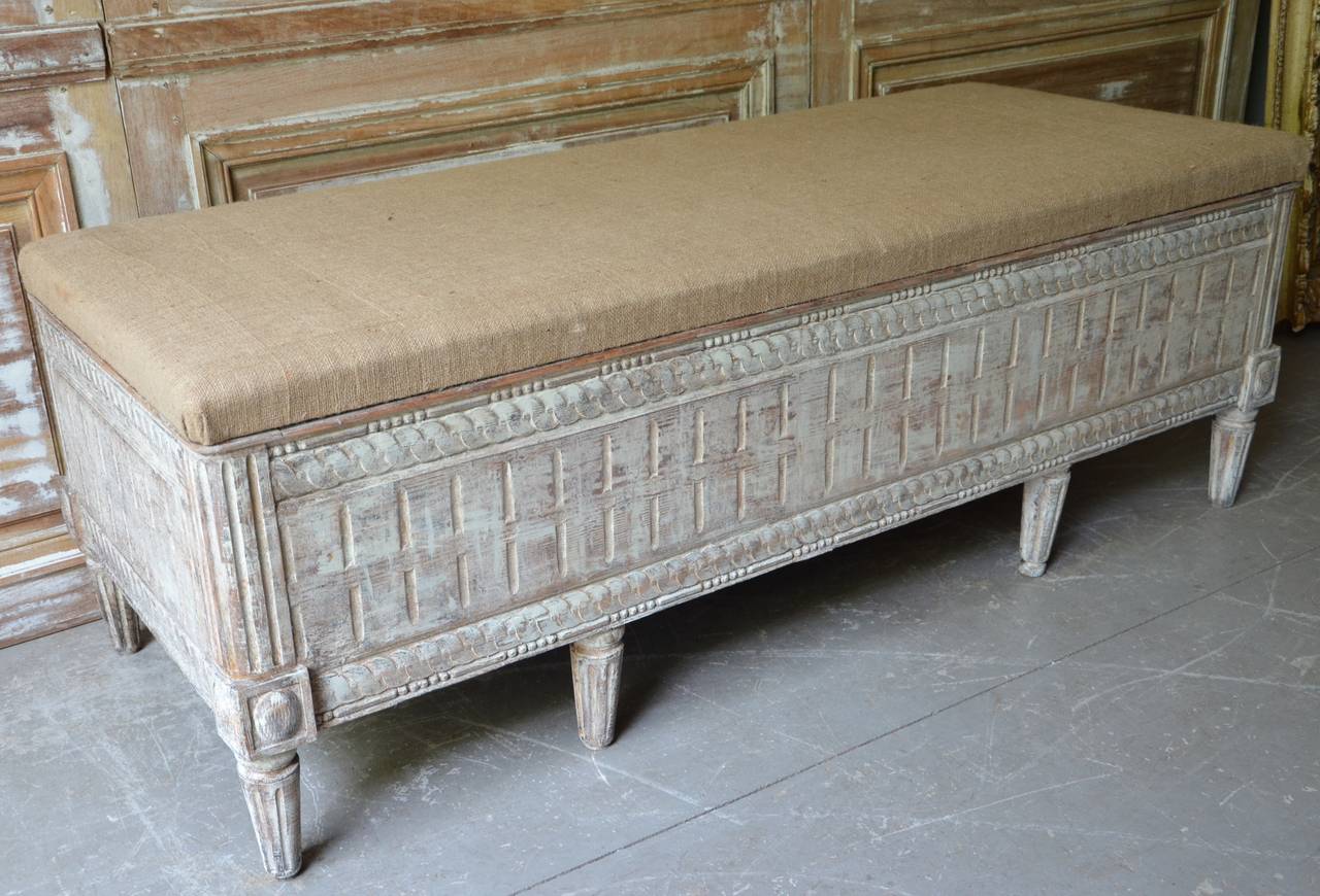 19th century Swedish Gustavian Bench beautifully decorated to front and side panels with scrolling trims, fluted corners and flower decorations around tapered feet.
Very practical, large storage under the seat.
Sweden circa 1880