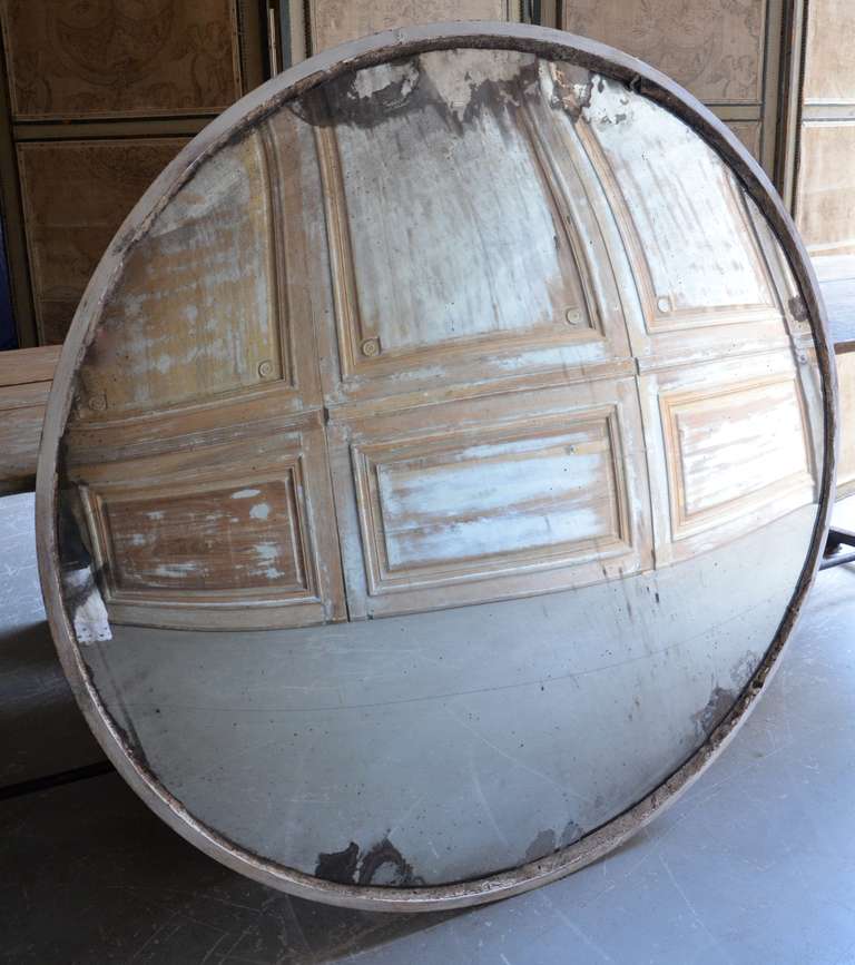 A huge convex traffic mirror.
France circa 1950

available two pieces. Price per item.