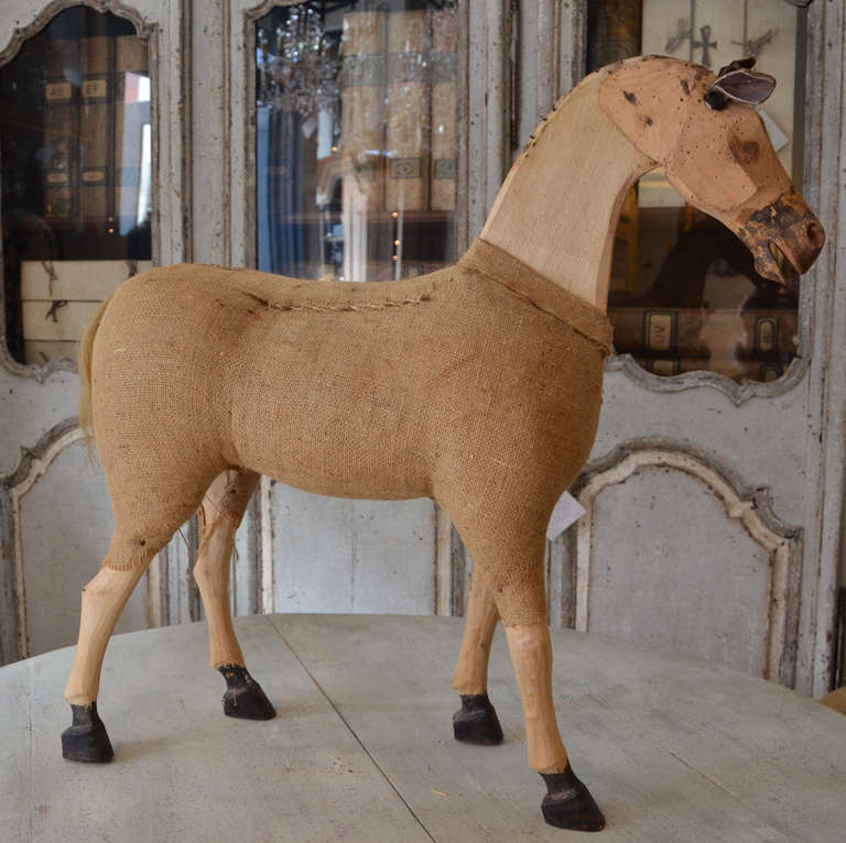 Charming 19th century French Toy Horse Fragment covered with burlap