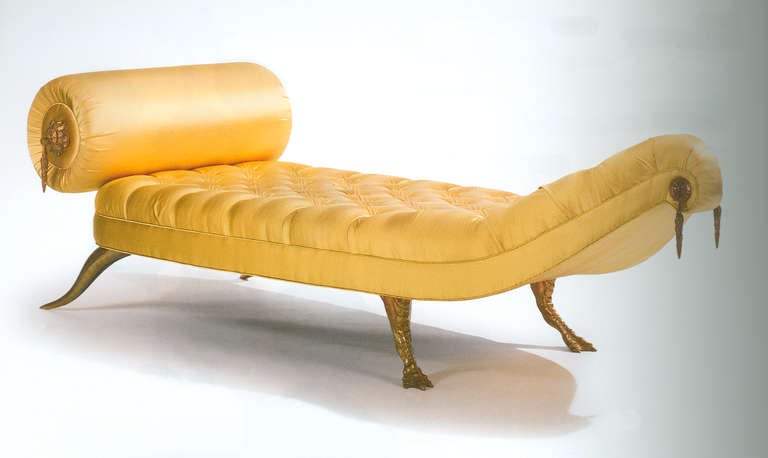 Jaba Daybed, designed 1997. Gilt bronze with fabric upholstery. Stamped Brazier-Jones
Measures: Depth: 32.76 in ( 83.2 cm ), Width: 98.5 in ( 250.2 cm ), 
Height: 29.88 in ( 75.9 cm ), Seat height: 15.55 in ( 39.5 cm ).