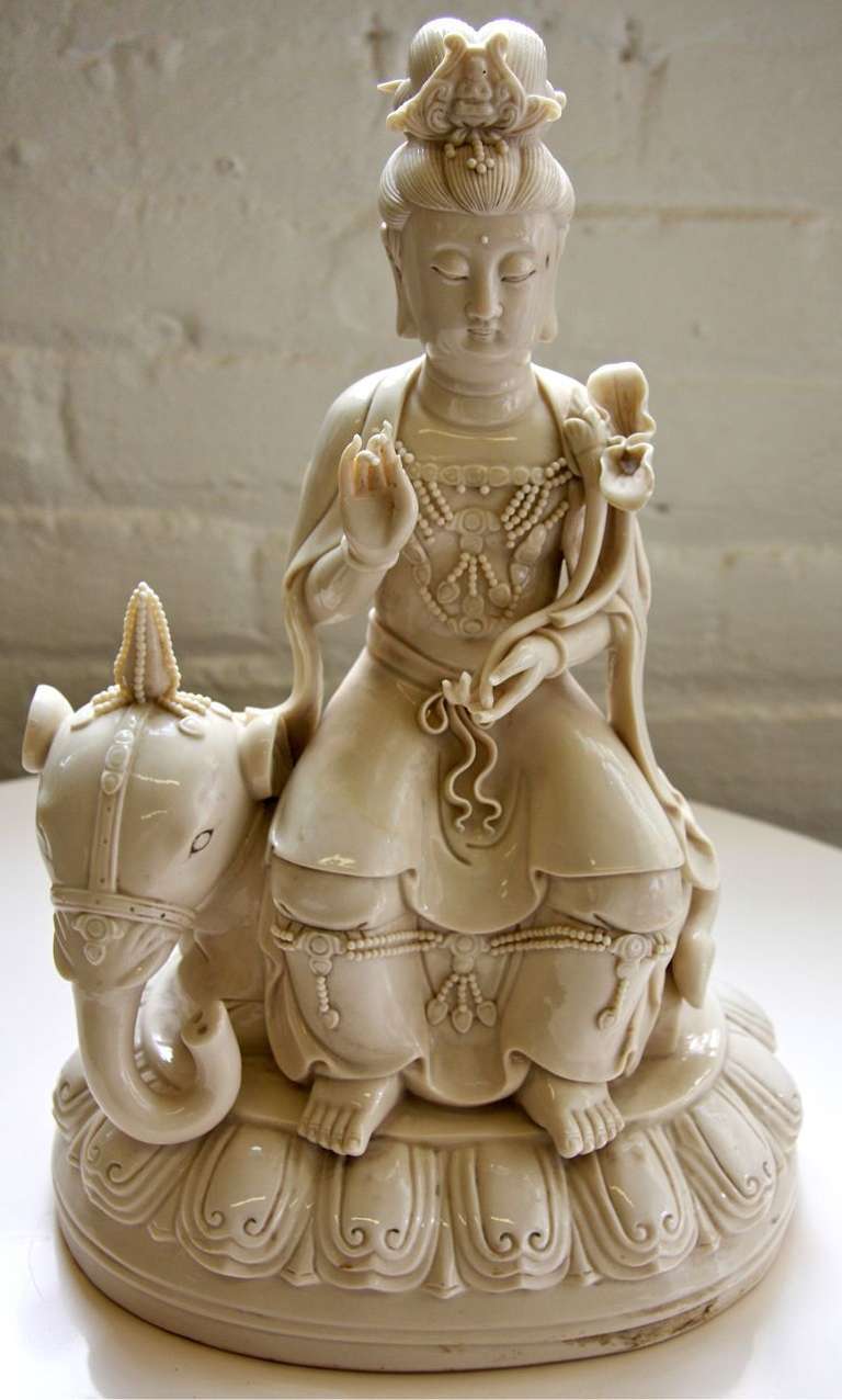 Blanc de Chine Chinese Porcelain Ceramic Sculpture of Kwan Yin Seated on Elephant