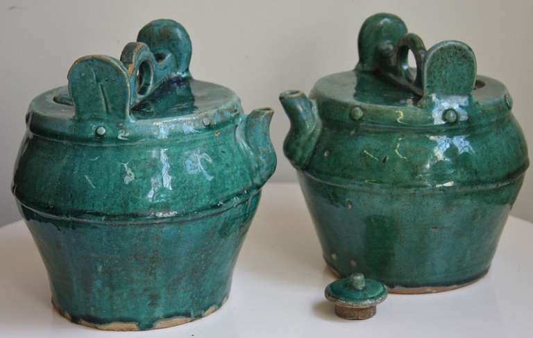 Pair antique Chinese Oriental monochromatic green glazed ceramic porcelain wine urns