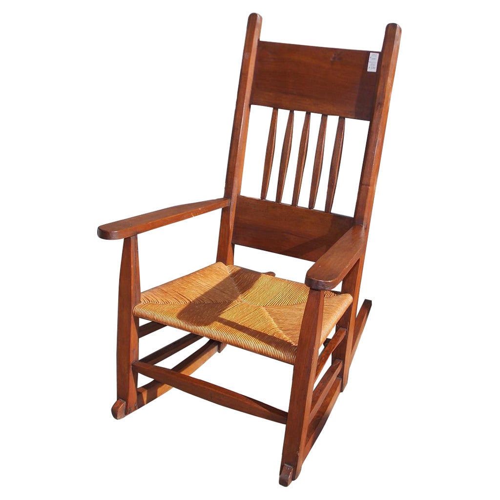 American Walnut Rocking Chair with Rush Seat. Circa 1870