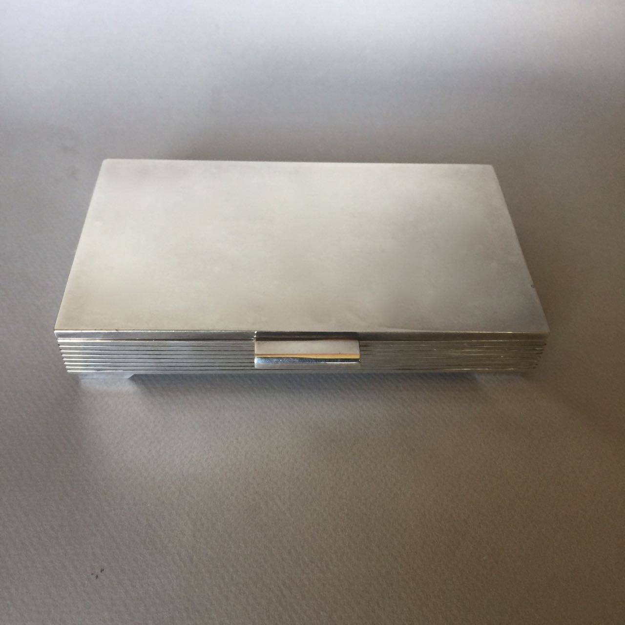 Georg Jensen sterling silver keepsake box no. 712C by Sigvard Bernadotte.

Sleek, Machine Age period. Heavy guage and handmade. Sterling silver.

Sigvard Bernadotte (1907 - 2002) was a Swedish prince, the second son of King Gustav VI of Sweden.