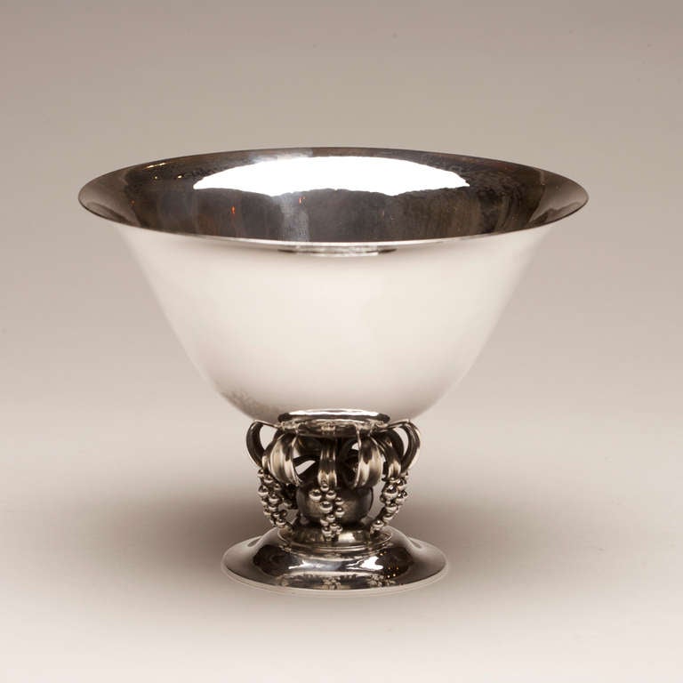 Rare Georg Jensen bowl no. 775 by Harald Nielsen.

Exquisite hand hammered sterling silver bowl with grape motif along the stem. Made in Denmark,

circa post 1945.

Harald Nielsen (1892 - 1977) is an important figure in the history of the