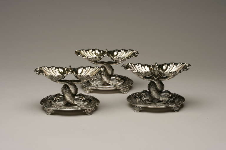 Odiot Salt Cellars With Oval Base (Set of Three) <br />
<br />
Charles-Nicolas Odiot Double Salt Cellar with fish motif, Paris France. Incredible hand chased detail, 950 silver. Early 20th century.<br />
<br />
Dimensions: 6.25L x 2.75D, Base: 5.25L
