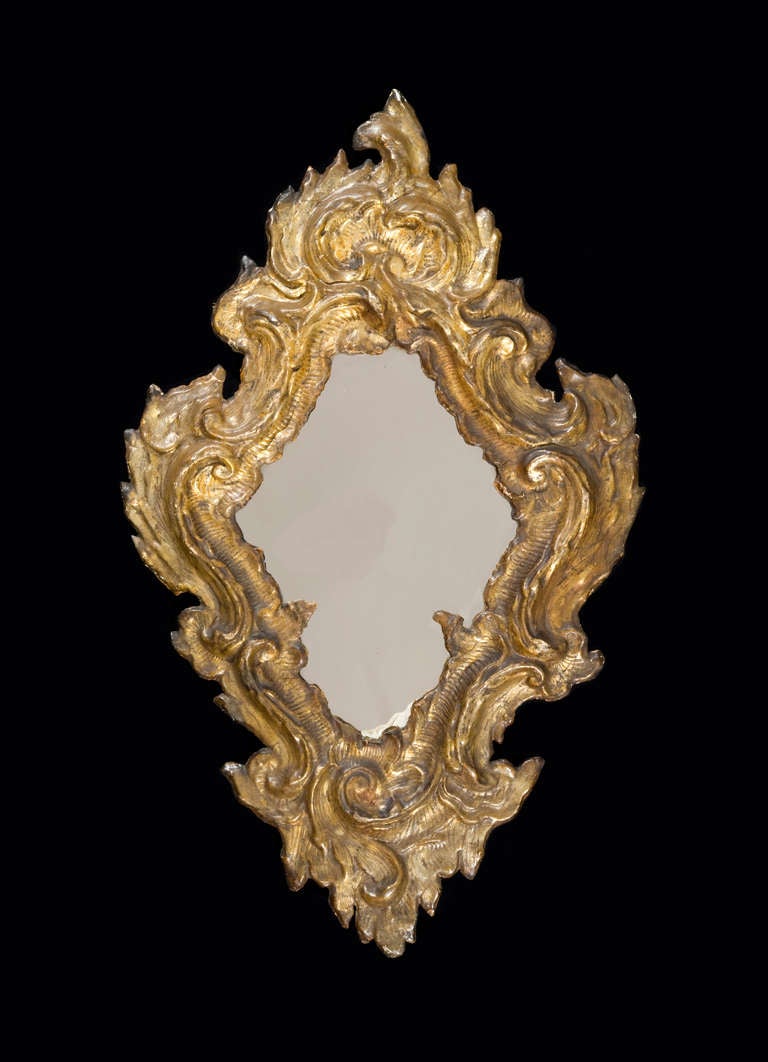 18th c. Ornate Italian Mirror
Giltwood
45 x 27.5 inches (114.3 x 69.8 cm)