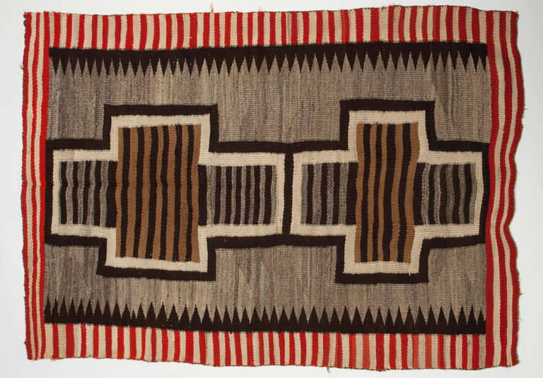 c. 1890 Navajo Transitional Rug

The period around 1880-1900 marks a transition in all aspects of Navajo life—social and material, political and personal. The railroad reached the southern border of the reservation in 1881, bringing jobs and more