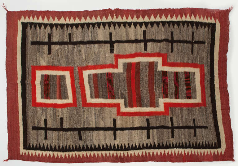 c. 1890 Transitional Navajo Rug

The period around 1880-1900 marks a transition in all aspects of Navajo life—social and material, political and personal. The railroad reached the southern border of the reservation in 1881, bringing jobs and more