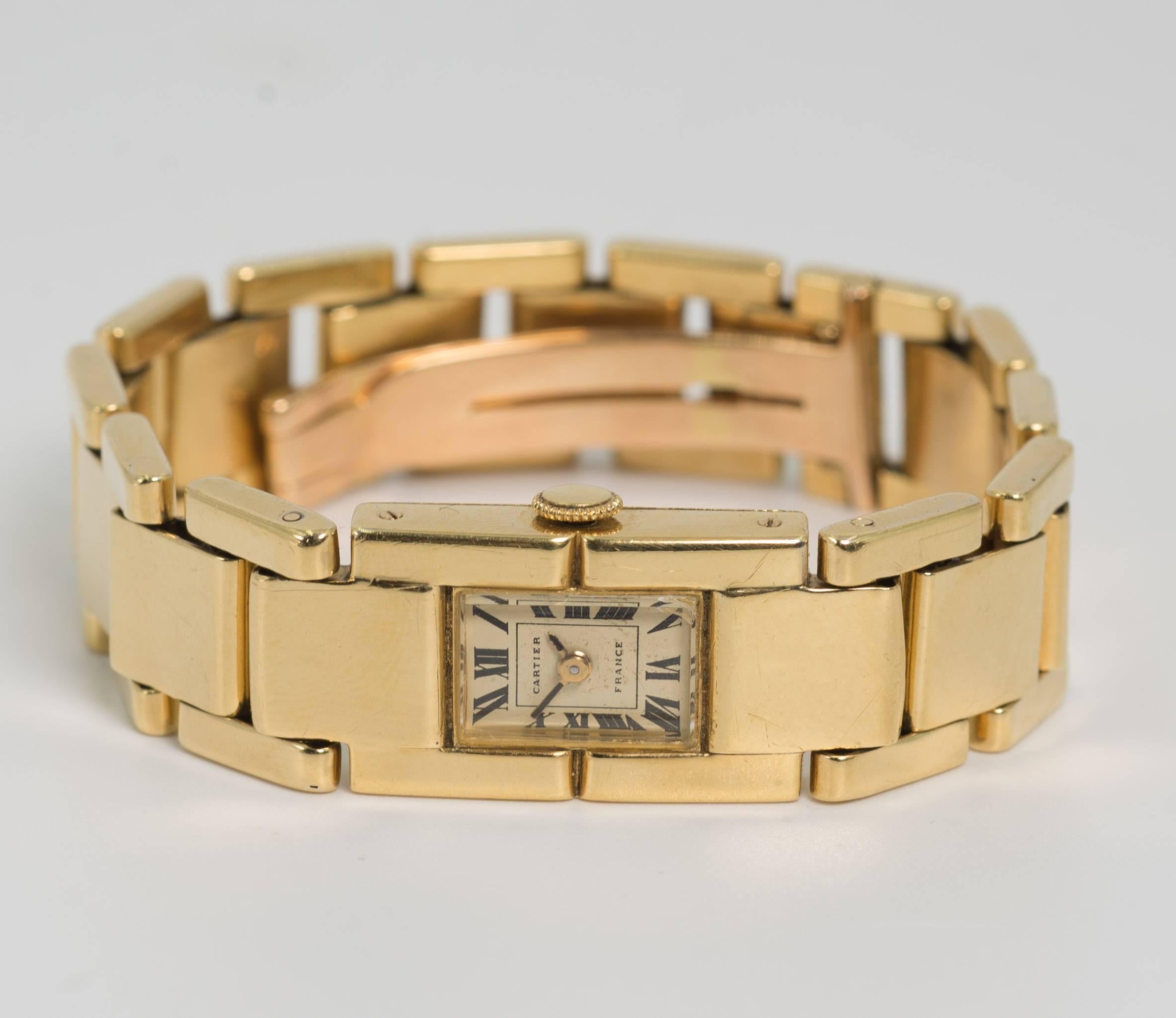 Rare Cartier Art Deco 1929 18karat gold brick bracelet Tank watch original very good estate condition. The rare bracelet is true Tank treads pattern. The dial is totally original and is stamped Cartier France. Both the watch and bracelet maintain