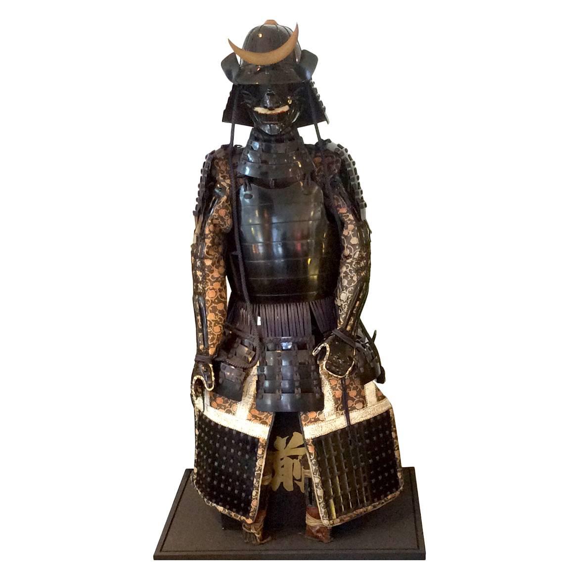 Samurai Armor Under a Glass Box with LED Lighting. Sold