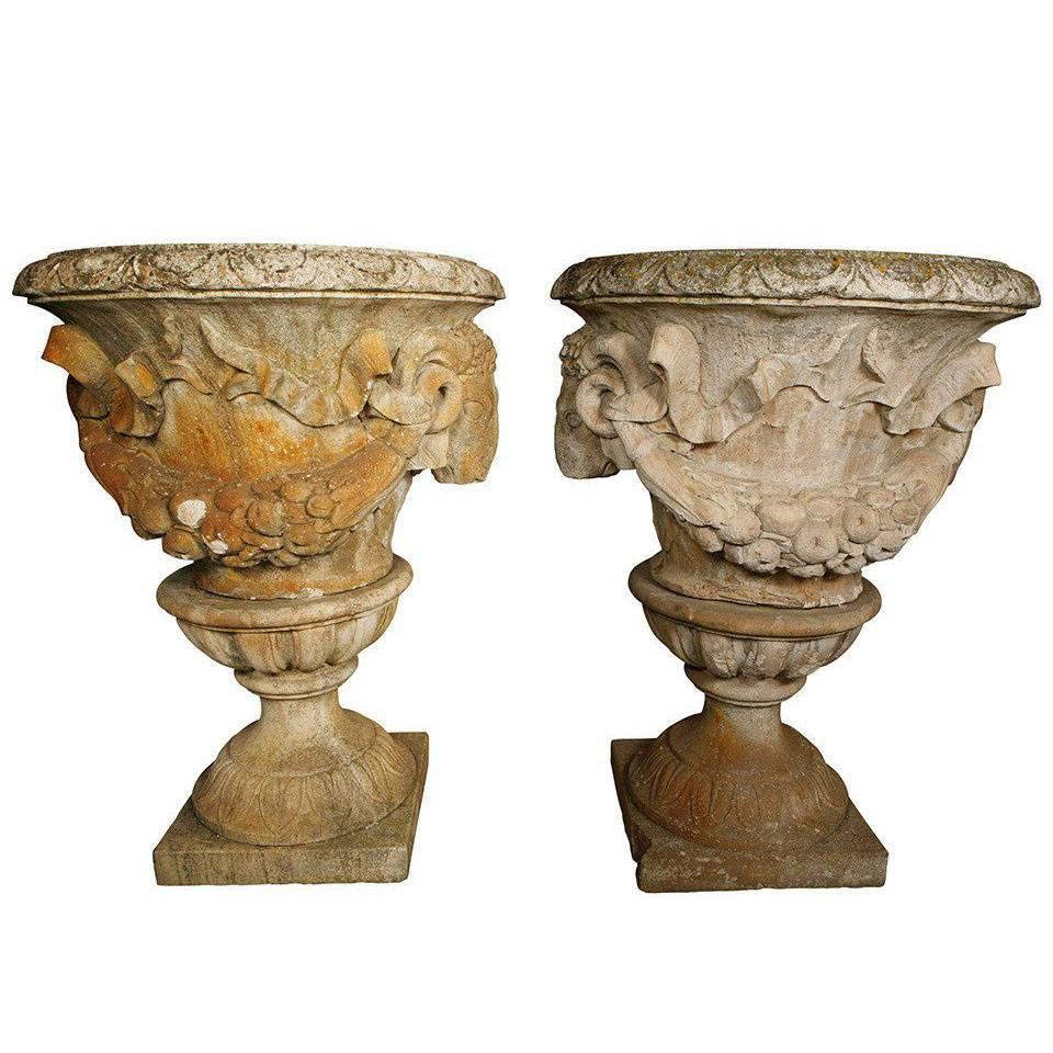 Pair of White Terracotta Urns with Lamb's Head Decoration