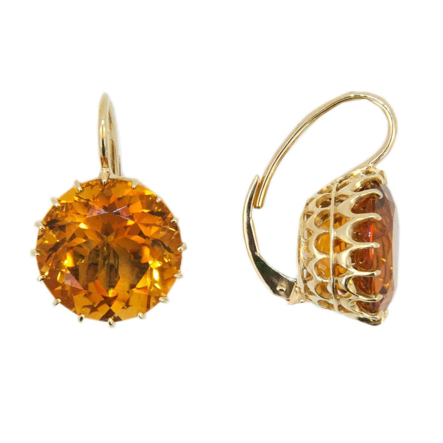 Gorgeous rich Honey colored Citrine earrings on a wire. Stones hand picked by Laura Munder. 18k yellow gold 13.9mm round Honey Citrine multi prong wire earrings. 17.59 carats total weight. Pierced leverback.
