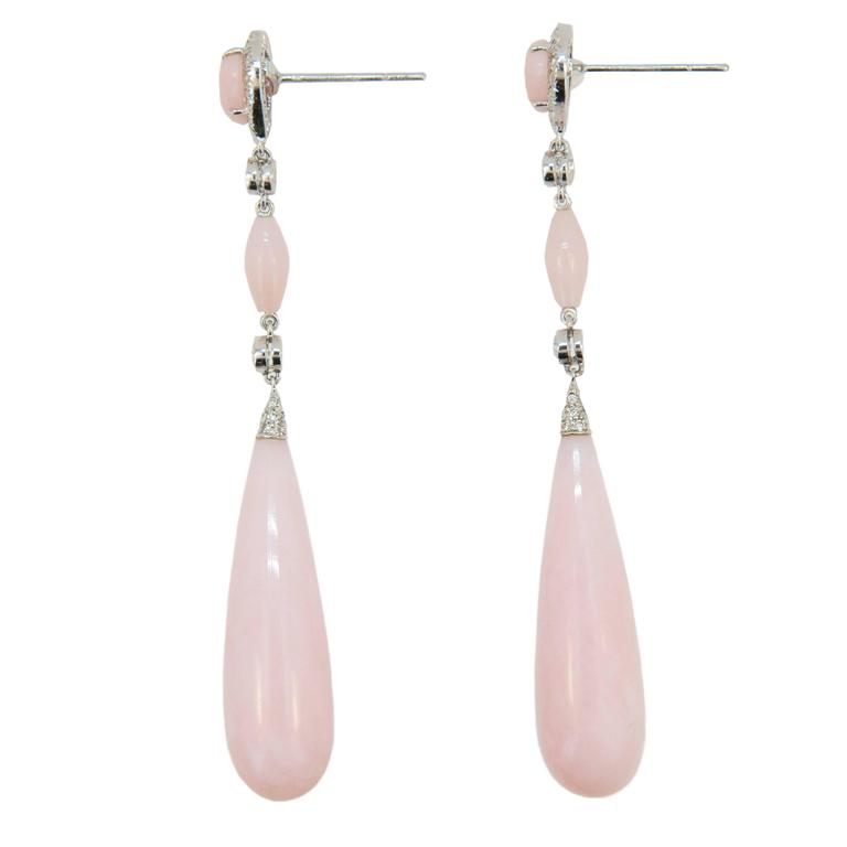 Delicate but Important, Pink Opal and diamond earrings by Laura Munder. 18k white gold dangle earrings each set with (1) long Pink Opal drop (2)=approx. 36.18cts.twt., (1) pear shape and (1) elongated bead (4)=approx. 3.55cts.twt. also set with (2)