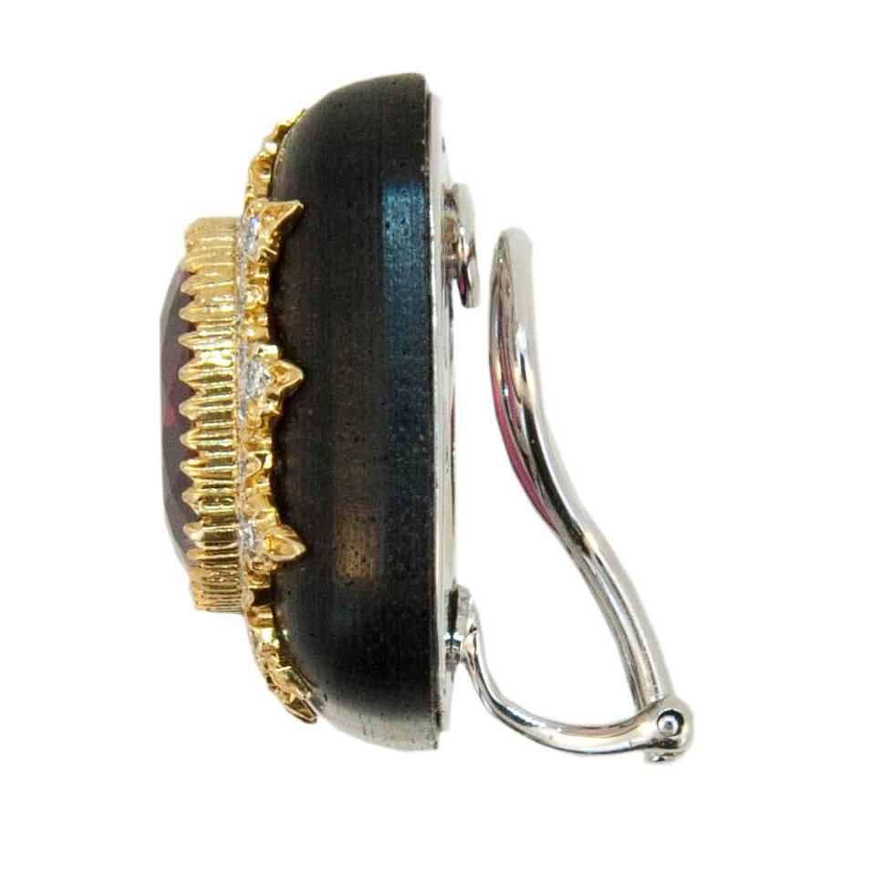 Exceptional Rubellite Tourmalines hand selected by Laura Munder. 18k yellow and white gold earrings. Rounded squares of Grenadill wood each set with one faceted cushion cut beautifully matched Rubelite Tourmaline one weighing 11.80 carats. and one