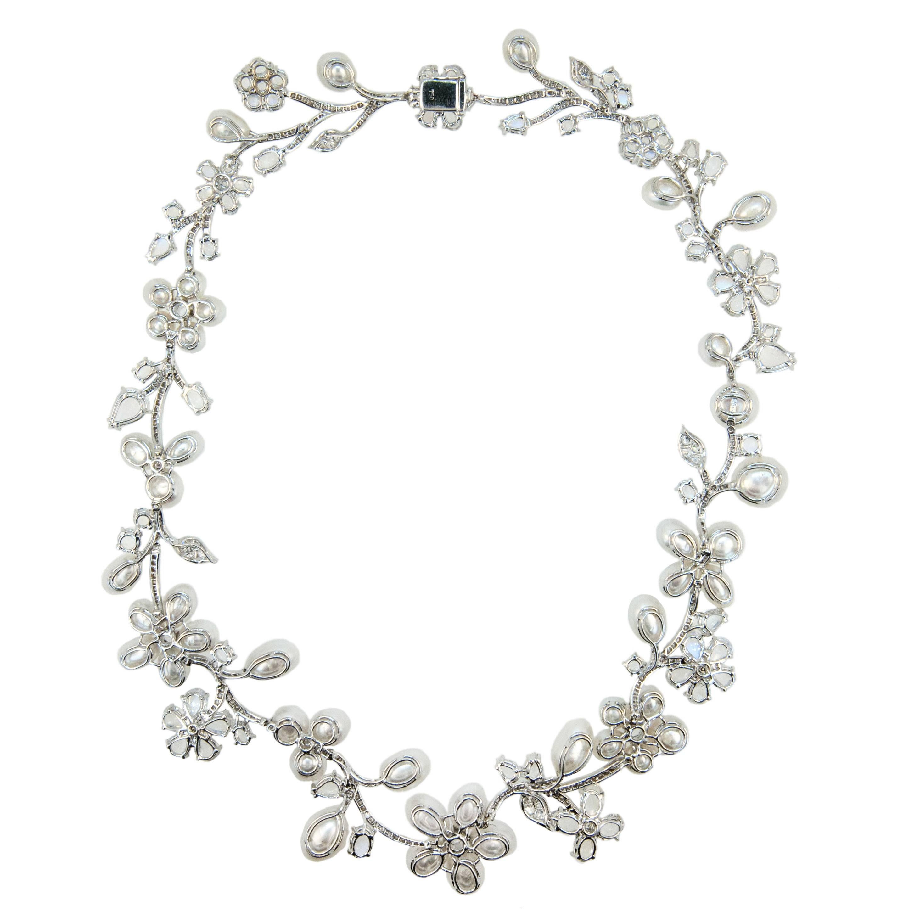 Exquisite Keshi pearl, moonstone and diamond necklace. Contemporary with timeless elegance. 18 karat white gold necklace floral motif set with 44 Keshi Pearls 27.53 total weight. 69 pear, round and oval Moonstones 35.82 carats total weight. Eight