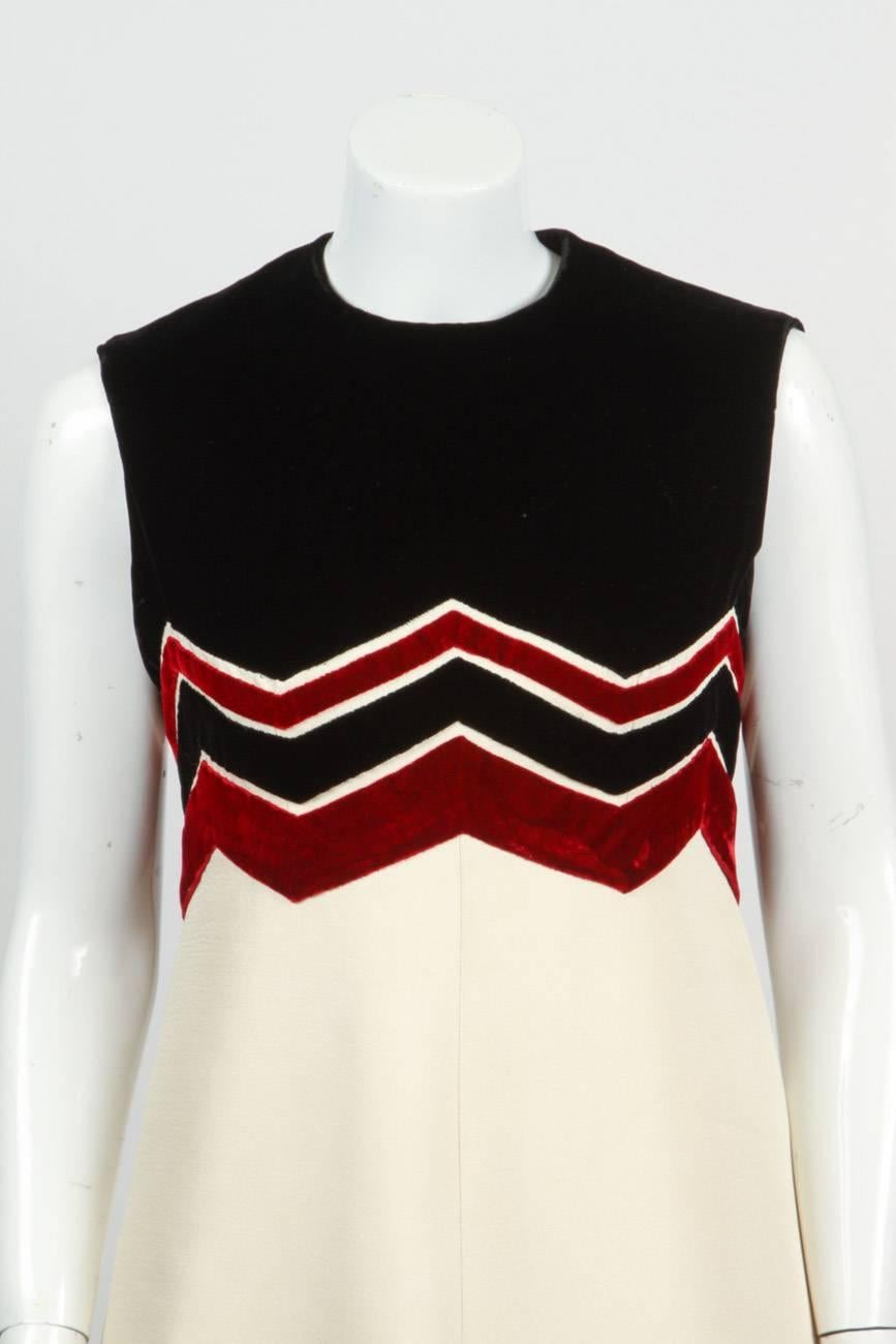 1971 fall/winter collection Pierre Balmain haute couture silk sleeveless evening gown with red and black velvet repeating chevron trim at bodice and hem. This same dress is in the permanent collection at the Metropolitan Museum of Art. In very good
