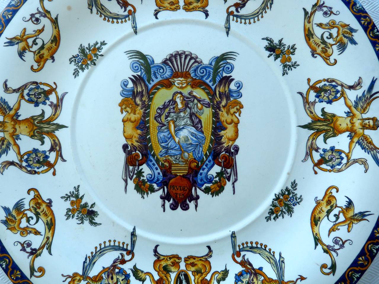 A late 19th century French Gien Istoriato Renaissance Revival faience charger, circa 1880.
The factory mark is in the back of the charger.