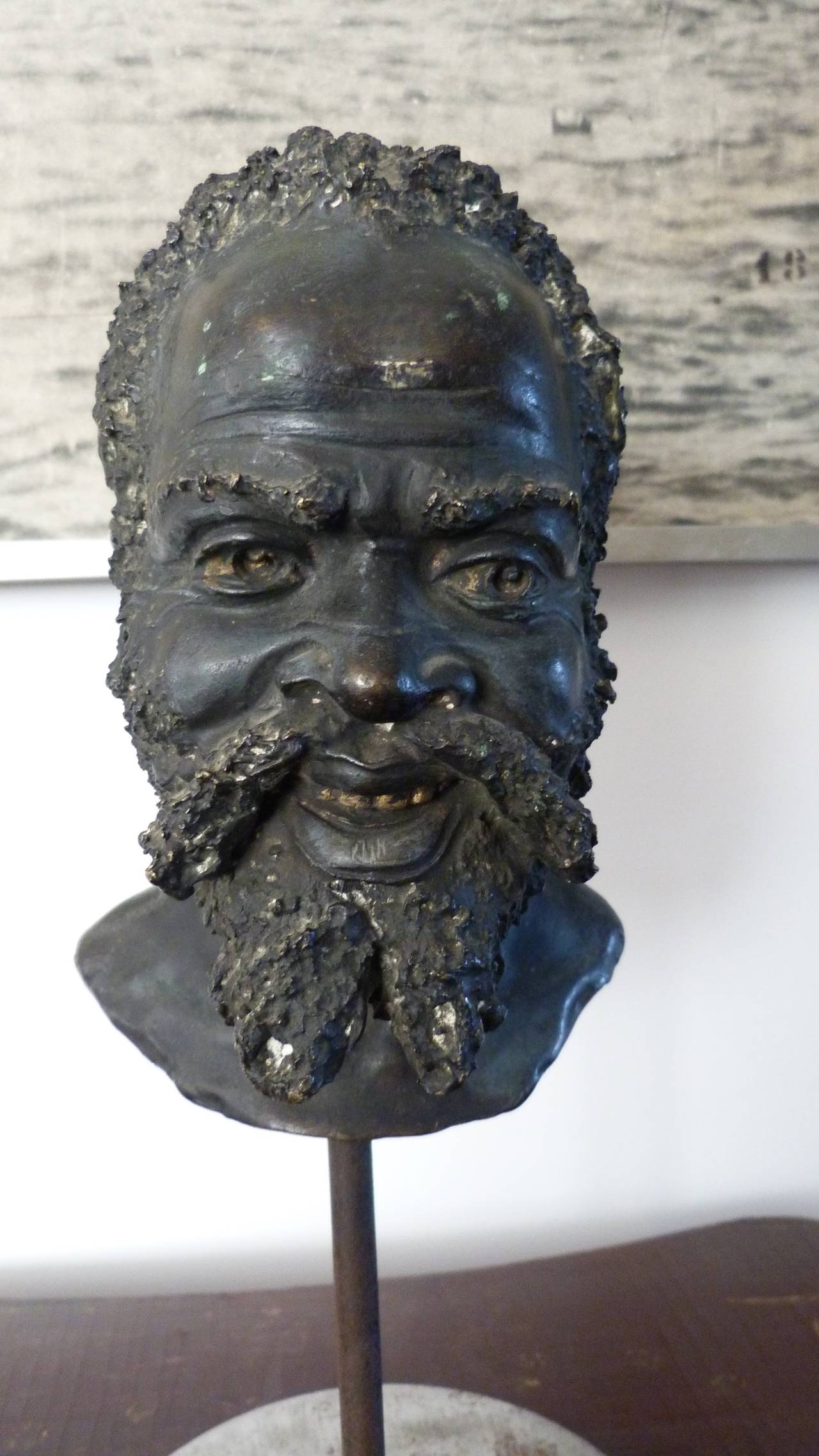 Pair of Blackmoores ( young and old ) bronze head sculptures. Both verso signed on the neck C. Mirra, late 19th early 20th century.

Measurements are stand included.