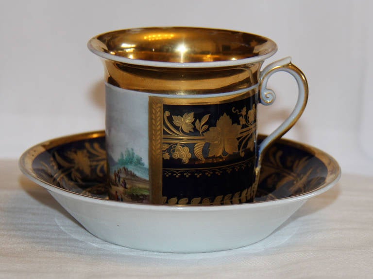 A 19th Century Russian Porcelain Coffee Cup and Saucer 1