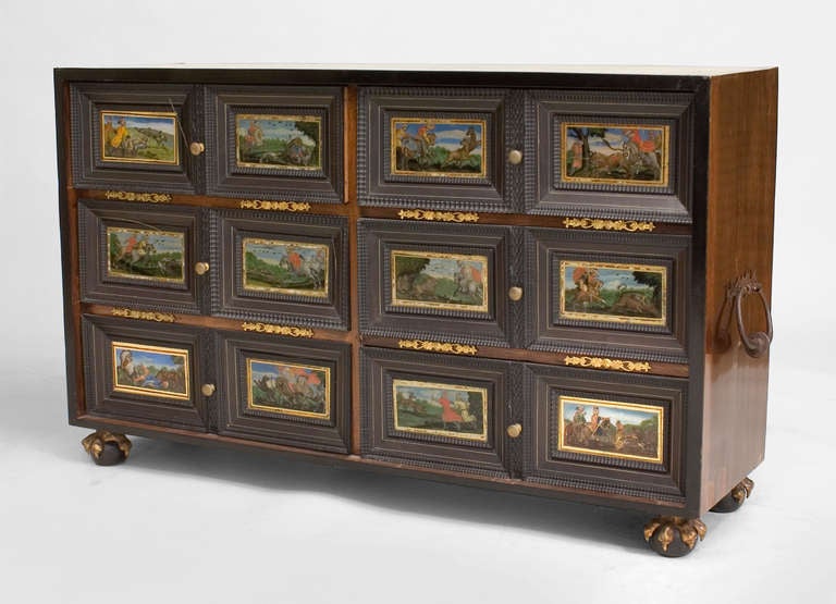 Continental (possibly Flemish 19/20th Century) ebonized cabinet with a series of reverse painted on glass panels on 6 drawers raised on claw feet (Related Item: PPF077A)
