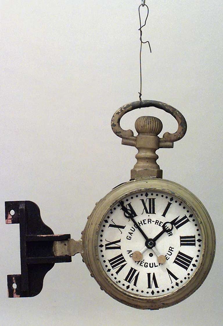 Nineteenth century French yellow painted and decorated tole clock sign in the form of an oversized pocket watch (Non-operational).