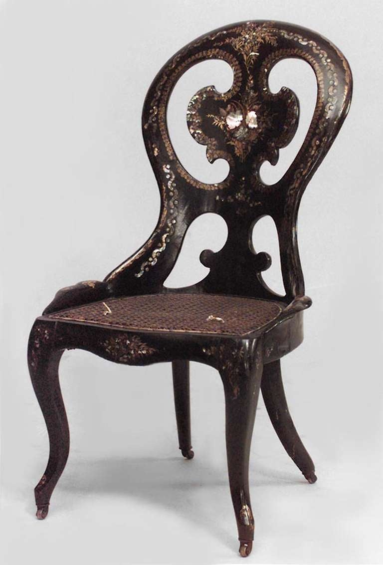 Nineteenth century English papier mache side chair with an open back design and inlaid floral pearl designs.
