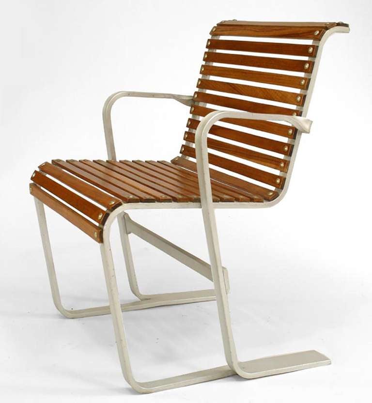 Set of 4 Mid-Century (Bauhaus) aluminum framed arm chairs with slat wood seat & back (att: Marcel Breuer) (mfr. by Meubles Stylcair, Lyon) (ref: M. Droste-MARCEL BREUER Design)
