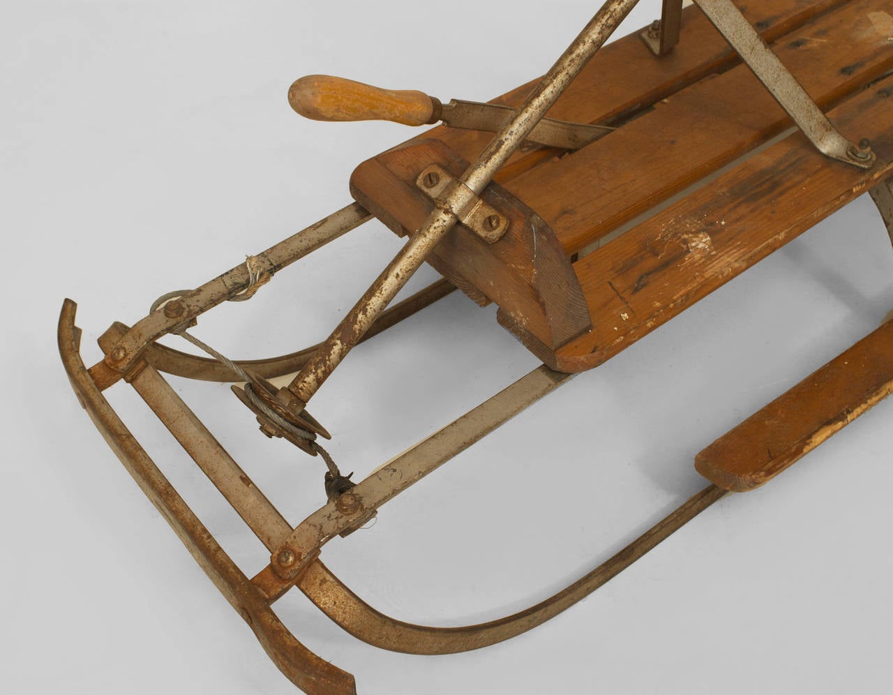 antique sled with steering wheel